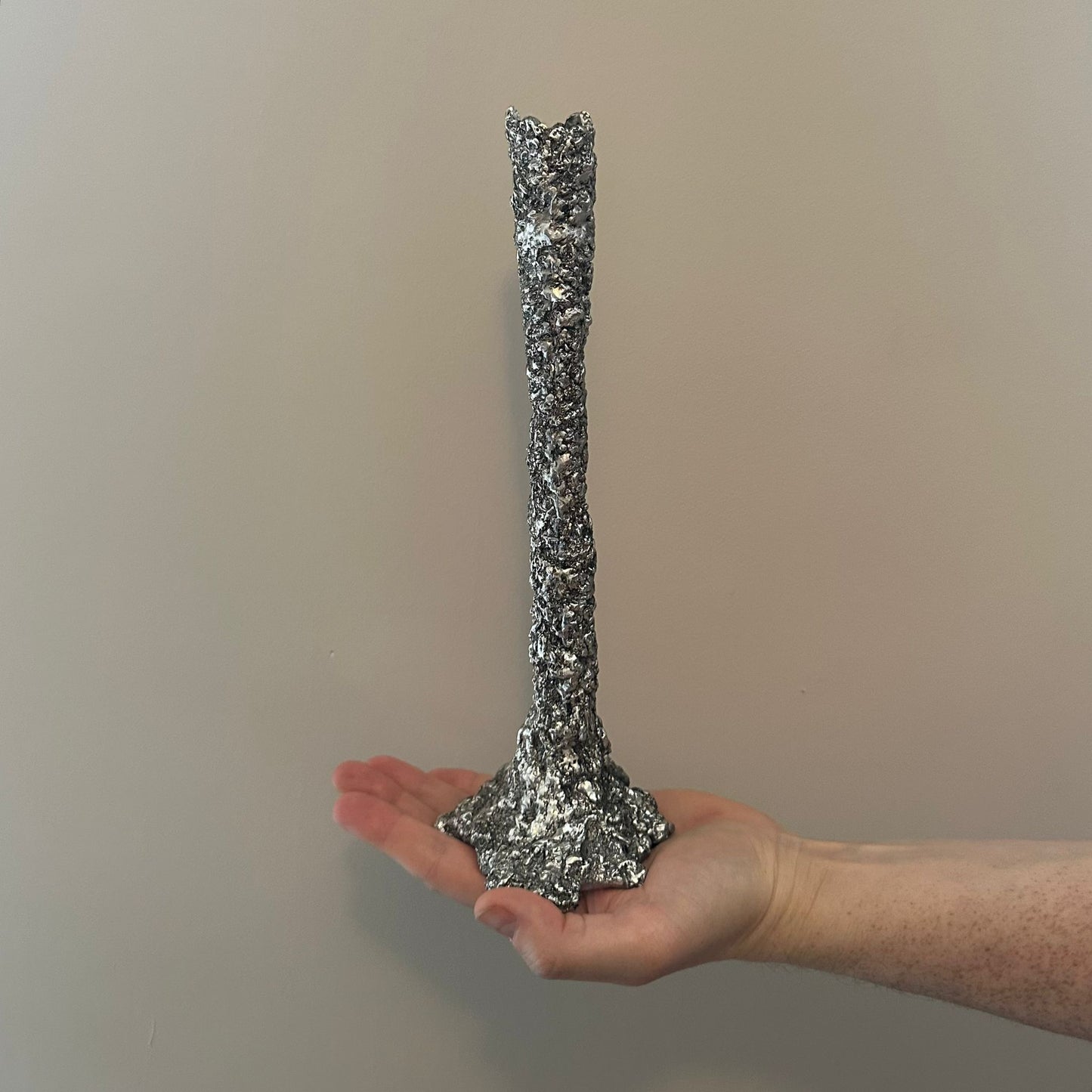 The Silver Candle Holder